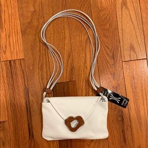 Hand Carved Handbag by Kimberly Chalos